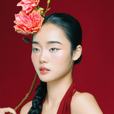 In this example, we create a square PNG for a social media profile picture, such as YouTube, Facebook, or Instagram. By choosing the "Fully Covered Canvas" mode, we crop the original portrait image of a woman to a 400x400 canvas. In this mode, the image is sacled to completely fill the canvas, so all four edges of the image touch all four edges of the canvas. As the input image doesn't fit the canvas precisely, some parts of it get cropped. To keep the woman's face centered and fully visible on the canvas, we interactively move the cropping area down by 64 pixels from the top. (Source: Pexels.)