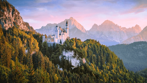 In this example, we load a photo of a mountain-top castle surrounded by a forest and extract its color palette with the colors sorted from the darkest color to the lightest color. We find the ten most popular tones and draw them on the screen together with their hex codes. (Source: Pexels.)