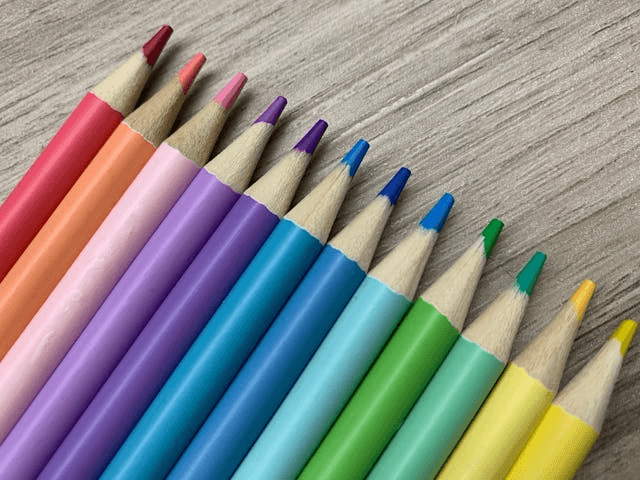 In this example, we create a digital color palette from a set of colored pencils. To turn each pencil color into a digital color, we manually click on the tip of the pencil and extract its color. We start with the pencil on the far left, which has an approximate color of Maroon, with a precise digital color value of XYZ(0.068, 0.036, 0.017). (Source: Pexels.)