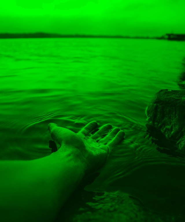 In this example, we split a PNG image of a hand in water into individual RGB components and extract the green channel. In the output PNG, the Red and Blue color components are equal to zero so they aren't shown and only the Green channel is drawn using its original pixel values. (Source: Pexels.)