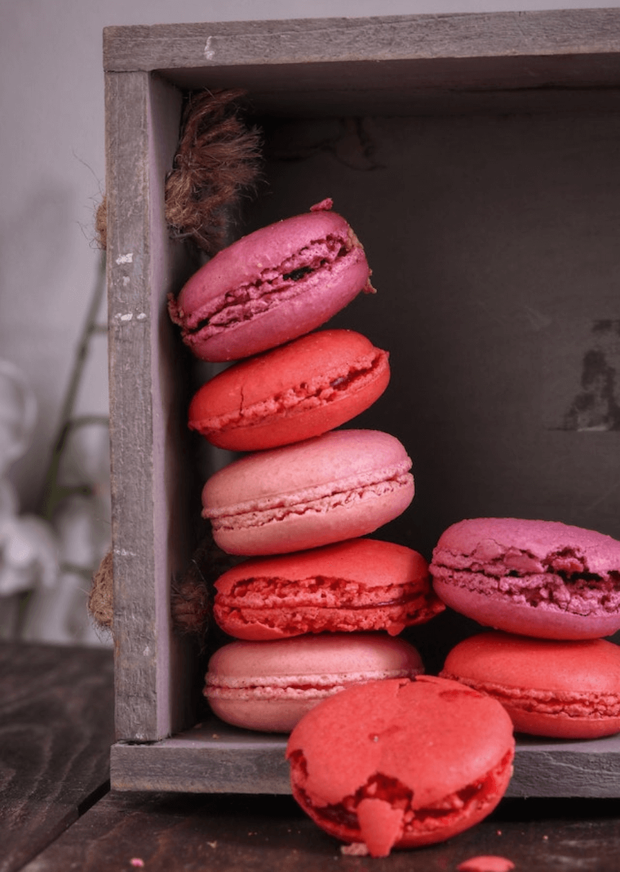 In this example, we apply the upsize algorithm on a PNG with pink macarons to make them the perfect size for our online store. We make the new PNG 40% larger than the original one by setting the scale parameter to 140%. In the output, we get a PNG sized at 896 by 1260 pixels. (Source: Pexels.)