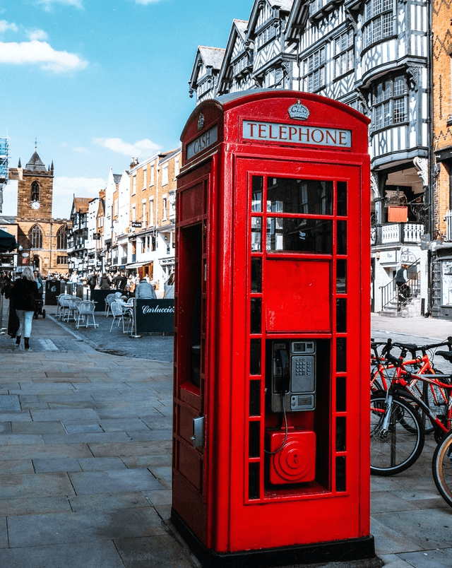 In this example, we create a retro-style PNG photo of a UK phone booth. To immerse ourselves in the 20th-century atmosphere, we turn the PNG photo into grayscale. We choose the monochrome noise mode and add random gray tone pixels to 10% of the photo area. (Source: Pexels.)