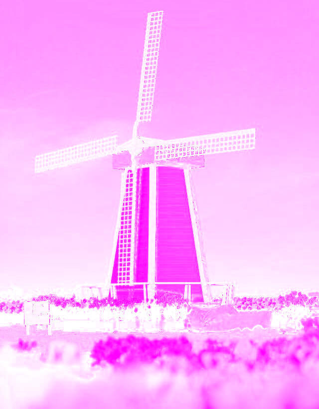 In this example, we input a PNG image of a colorful windmill and transform it into the magenta component of the CMYK color scheme. Thus, we obtain an image that shows the amount of magenta color required for the color printing of a PNG with a windmill. (Source: Pexels.)
