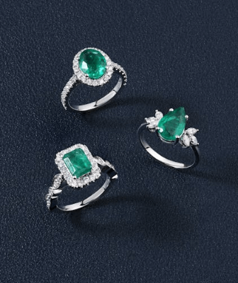 This example showcases a new jewelry collection using a unique GIF animation. It uses the "Pixel Dissolve" effect to progressively display three rings with green gemstones. The image is revealed pixel by pixel over 15 seconds and 50 frames. The animation starts with a transparent background, and a text overlay reading "New collection" in a black Monospace font. The design is kept minimalistic and the animation is configured for infinite looping so that once the image is fully displayed, the reveal restarts from the beginning again without user interaction. (Source: Pexels.)
