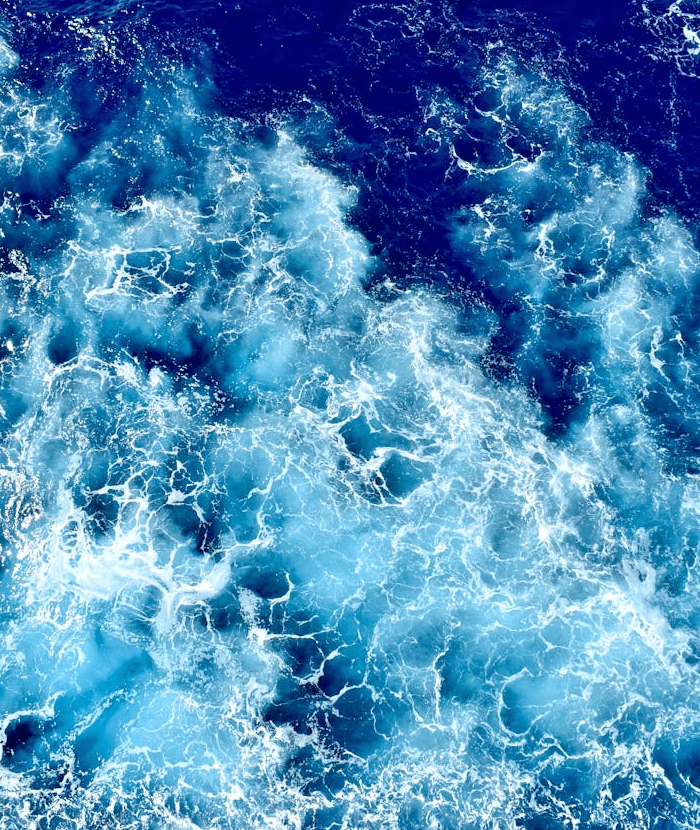 In this example, we make a decorative wavy cut from a PNG image of the ocean, full of blue waves. We increase the wave amplitude to 0.7, which creates long wave peaks resembling daisy petals. In total, we generate 10 petals and set the output dimensions of the final PNG to 640 by 640 pixels. (Source: Pexels.)