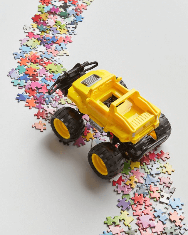 In this example, we split a PNG file of a toy car on a puzzle mat into two parts – one showing the saturation channel and the other showing the intensity channels. The saturation channel shows highly saturated regions of the yellow car body and colorful puzzle pieces, while the gray floor and black wheels appear dull as they have low color saturation. The intensity channel reveals the light distribution – the background and the yellow car are the brightest areas (so they are light gray or white), whereas the wheels are the darkest (so they are black). This comparison highlights how color purity and brightness vary across parts of the PNG. (Source: Pexels.)