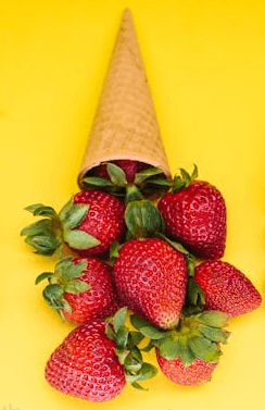 In this example, we upload a PNG image of three waffle cones filled with different fruits: one with blackberries and raspberries, another with strawberries, and the third with cherries. To focus on the strawberry cone, we select a rectangular region around the middle cone and crop the image, removing the other two cones. (Source: Pexels.)