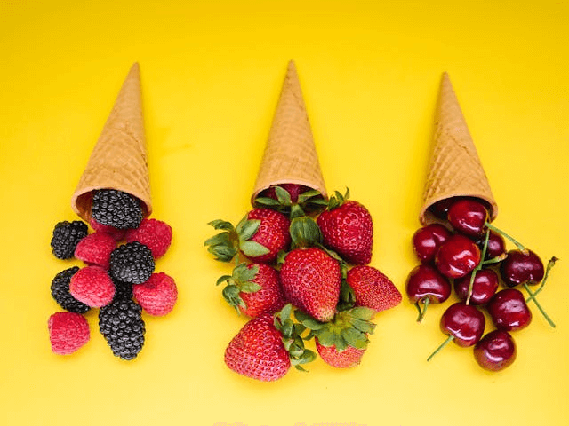 In this example, we upload a PNG image of three waffle cones filled with different fruits: one with blackberries and raspberries, another with strawberries, and the third with cherries. To focus on the strawberry cone, we select a rectangular region around the middle cone and crop the image, removing the other two cones. (Source: Pexels.)